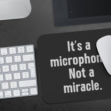 IT'S A MICROPHONE. NOT A MIRACLE. MOUSE PAD